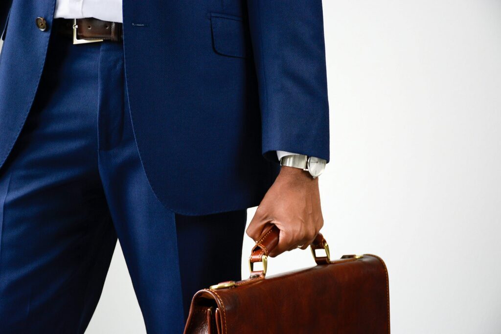 close-up-of-stylish-young-businessman-in-blue-form-LE6NCA6-min-scaled