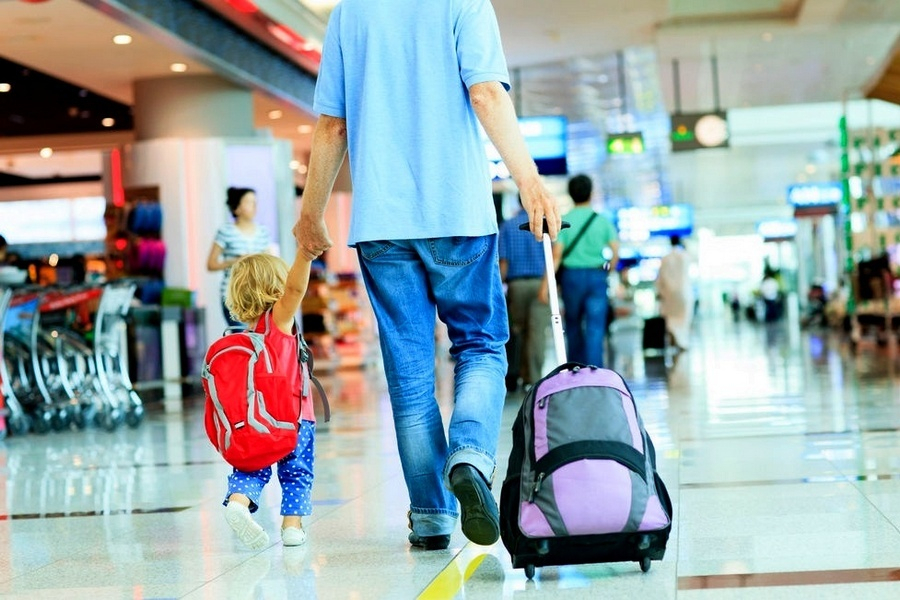 child-travel-accompanied-by-father
