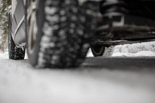 depositphotos_299090606-stock-photo-car-on-a-snowy-winter